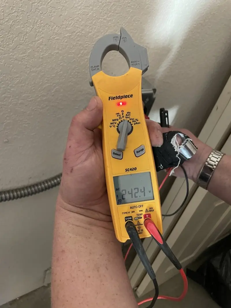Voltage testing with clamp meter during Whole House Surge Protector in Stallings